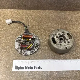 001002321 Honda 85 Atc70 Stator Backing Plate And Flywheel 1985 Atc 70