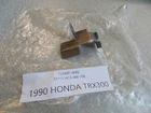 1990 Honda TRX300 Clamp Wire 32111-HC4-000 D'occasion. Price: $7.30.