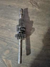 1996 Suzuki King Quad 300 Transmission Countershaft 24121-19B10 Used. Price: $15.00.