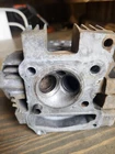 1985 Honda Fourtrax TRX125A Cylinder Head 12200-VM6-010 Used. Price: $45.00.