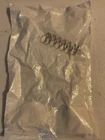 Oem New Polaris Headlight Spring 7043816. Price: $7.45.