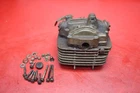 1987 Suzuki Quadrunner 230 Engine Top End Cylinder Head Assembly 11100-35B00 Used. Price: $124.99.